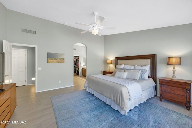 bedroom with ceiling fan and vaulted ceiling