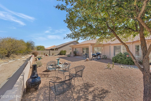 rear view of property with a patio