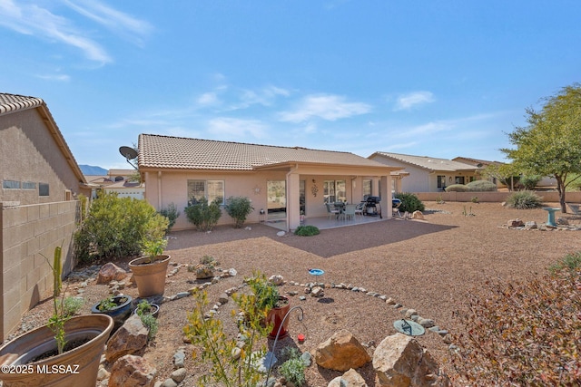 rear view of house with a patio area