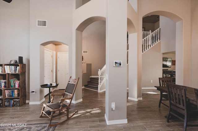 interior space featuring a towering ceiling