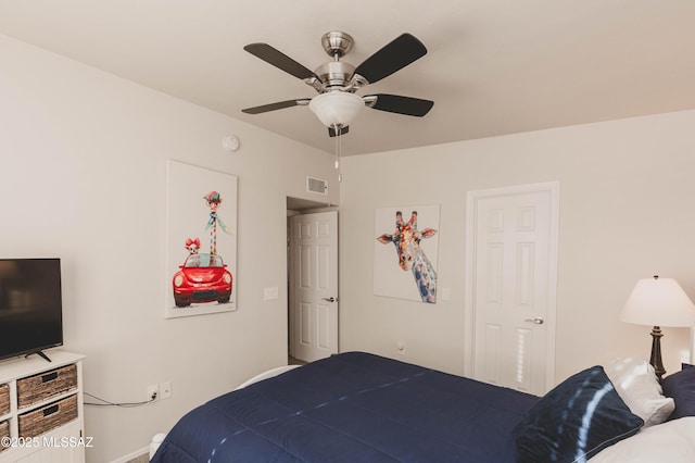 bedroom featuring ceiling fan