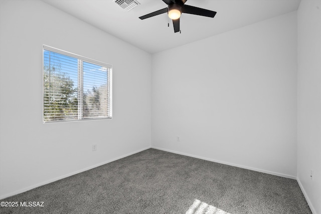 carpeted empty room with ceiling fan