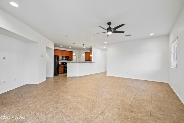 unfurnished living room featuring light tile patterned floors and ceiling fan