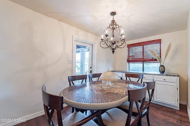 dining area with plenty of natural light, baseboards, and dark wood-style flooring