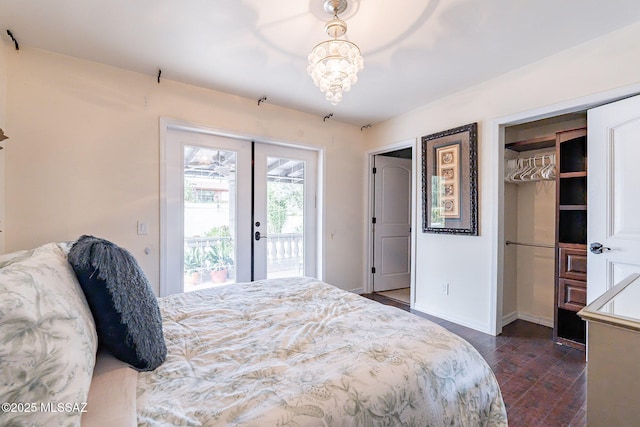 bedroom featuring baseboards, dark wood-style flooring, access to outside, and french doors
