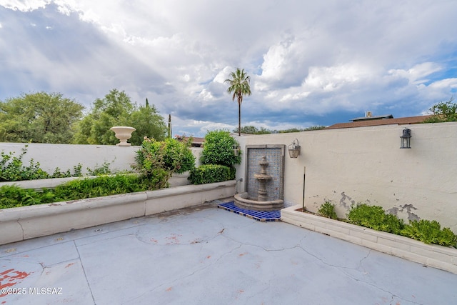 view of patio / terrace with fence