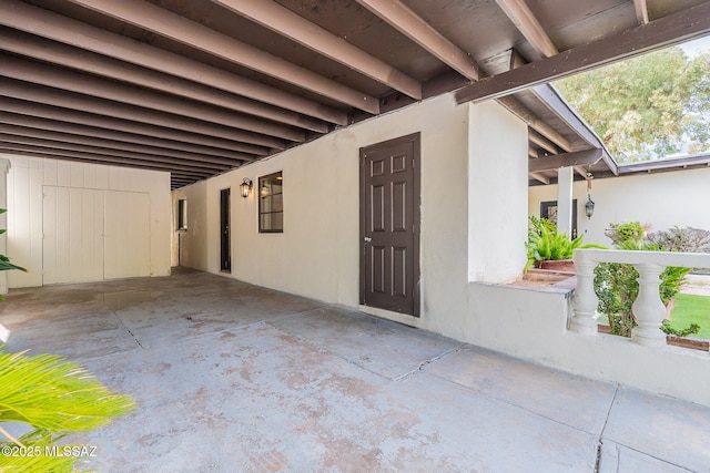 exterior space with stucco siding