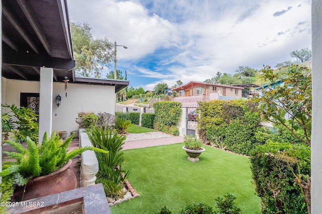 view of yard featuring fence