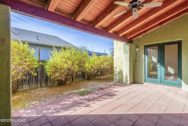 view of patio with french doors and ceiling fan