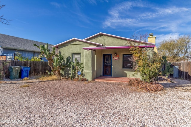 single story home featuring a patio