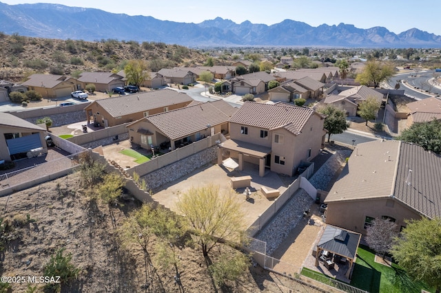 bird's eye view with a mountain view and a residential view