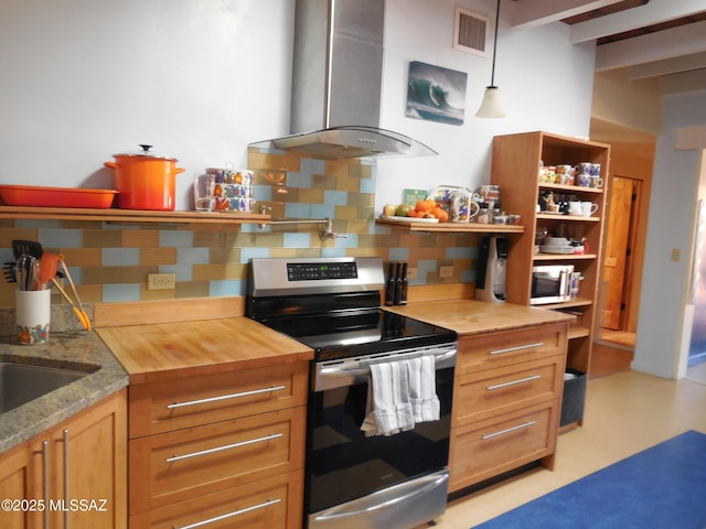 kitchen featuring open shelves, stainless steel appliances, visible vents, decorative backsplash, and wall chimney exhaust hood