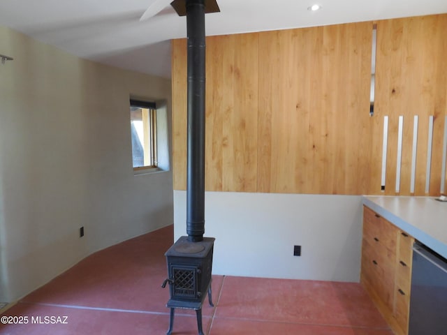 interior space featuring a wood stove