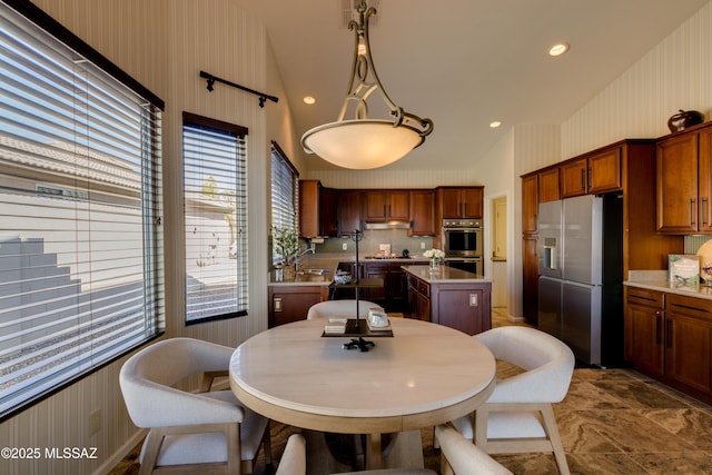 dining space with sink