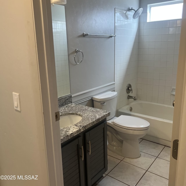 bathroom featuring shower / bath combination, vanity, toilet, and tile patterned floors