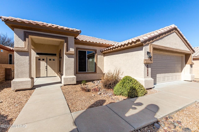 view of front of home with a garage