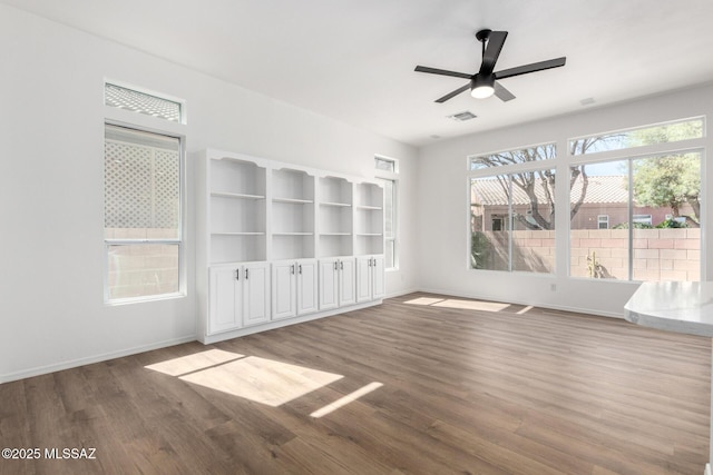 interior space with hardwood / wood-style flooring and ceiling fan