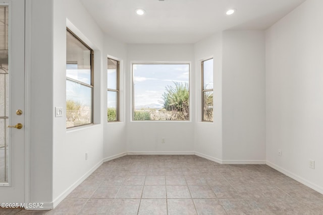 view of tiled spare room