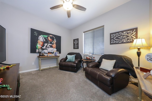 living room featuring ceiling fan and carpet floors