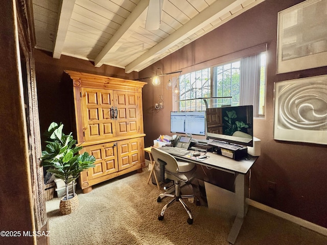 carpeted home office featuring wooden ceiling, baseboards, and beamed ceiling