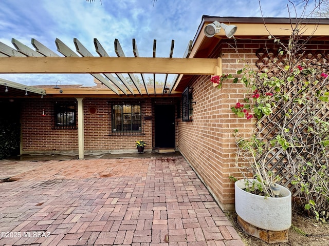 view of patio / terrace featuring a pergola