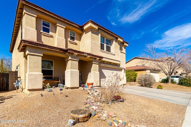 view of front of home with a garage