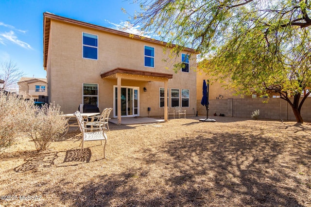 rear view of house with a patio area