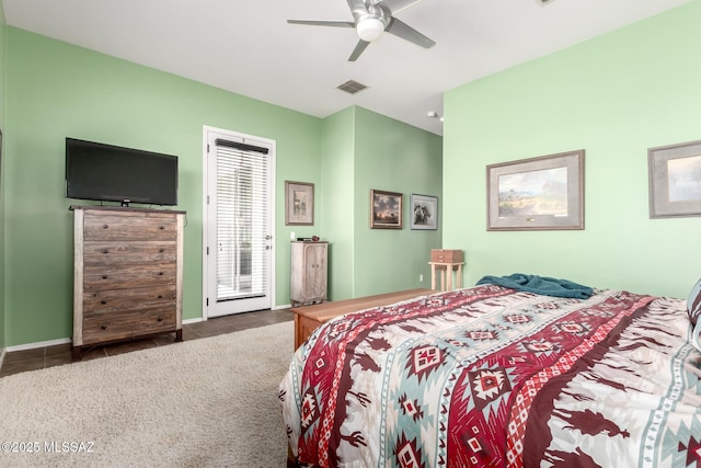 tiled bedroom with ceiling fan and access to outside