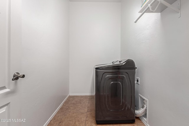 washroom with light tile patterned floors