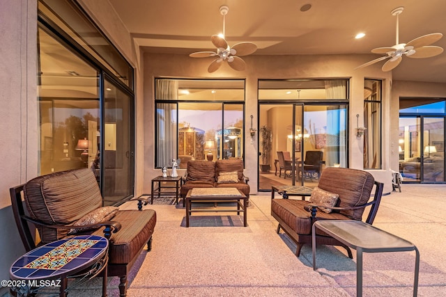 view of patio / terrace with an outdoor hangout area and a ceiling fan