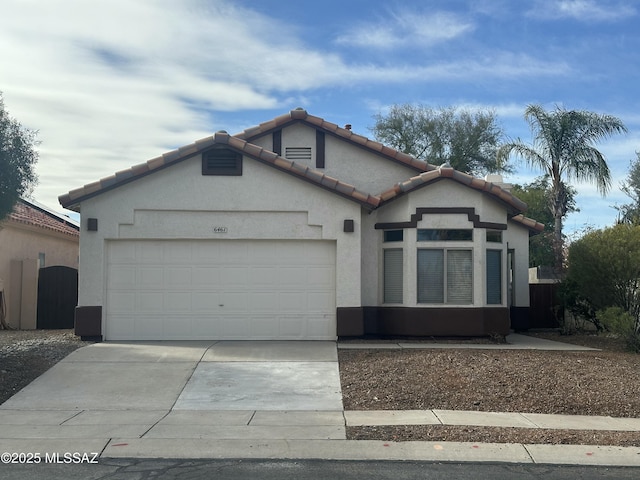 view of front of home with a garage