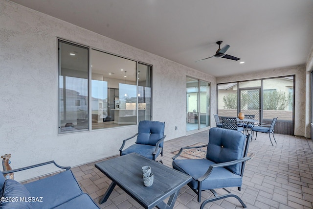 view of patio with ceiling fan