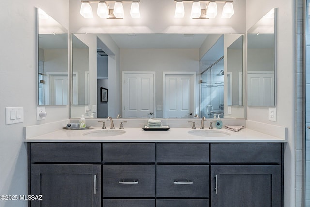 bathroom with vanity and walk in shower