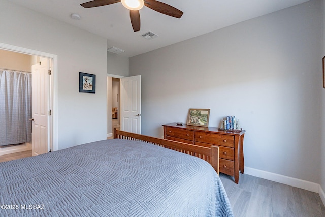 bedroom with ceiling fan and light wood-type flooring