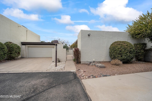 view of side of property featuring a garage