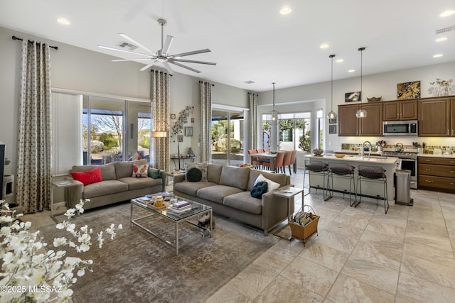 living room featuring ceiling fan