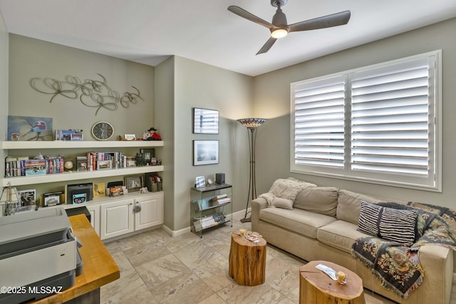 living room with ceiling fan