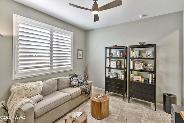 living room with ceiling fan