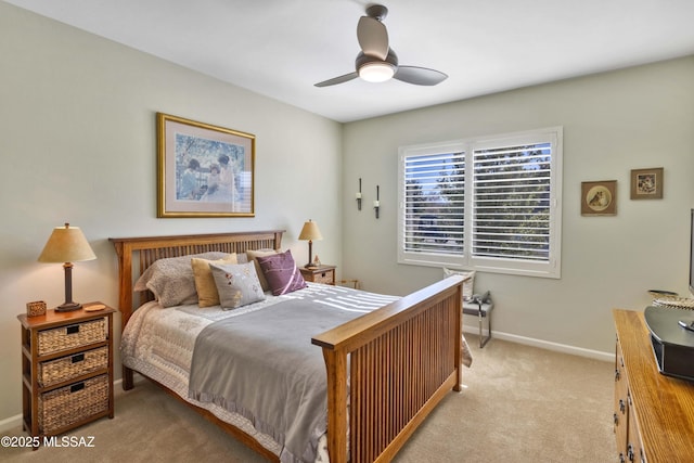 bedroom with light carpet and ceiling fan