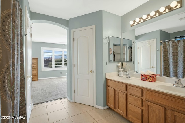 bathroom featuring tile patterned floors and vanity