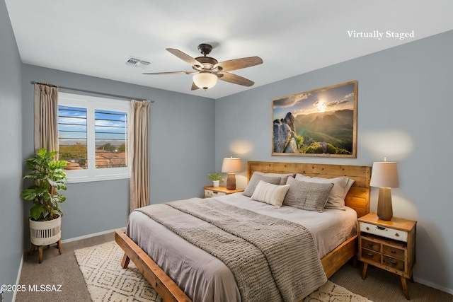 carpeted bedroom featuring ceiling fan