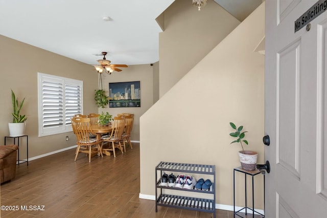 entrance foyer with dark wood-type flooring and ceiling fan