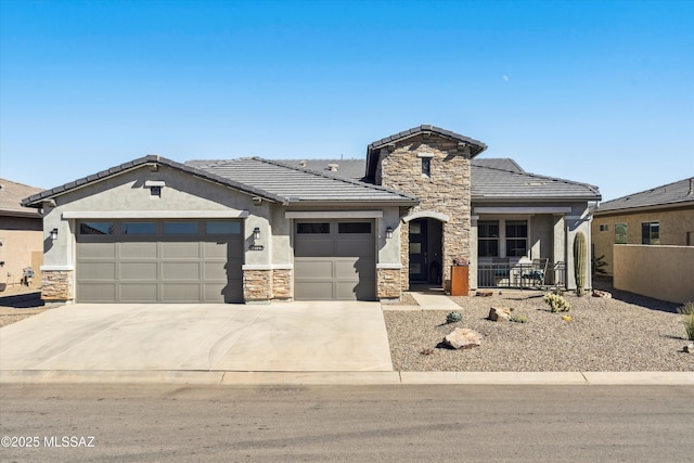 view of front of property featuring a garage