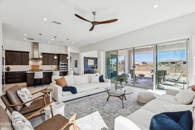 living room with ceiling fan