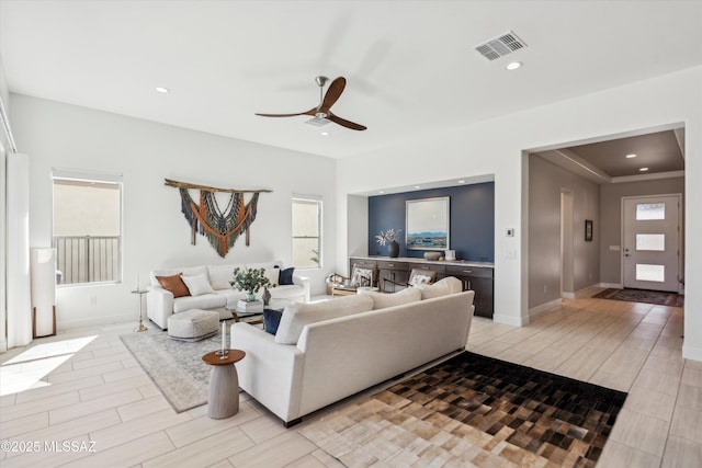 living room featuring ceiling fan