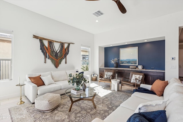 living room with ceiling fan