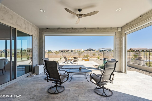 view of patio / terrace featuring ceiling fan