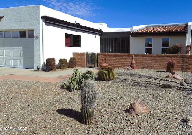 exterior space with a garage