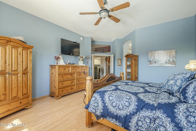 bedroom featuring ceiling fan and light wood-type flooring