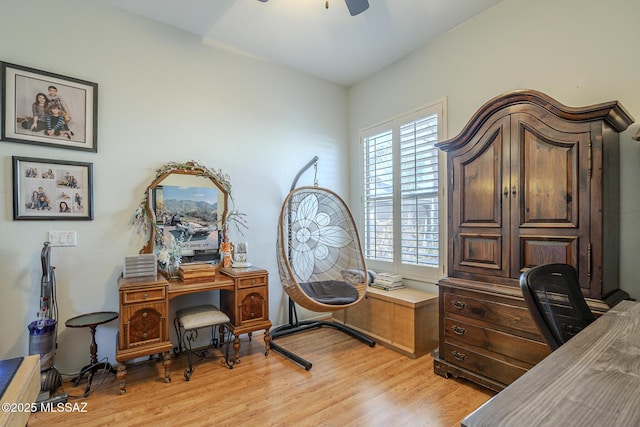 office area with ceiling fan and light hardwood / wood-style floors